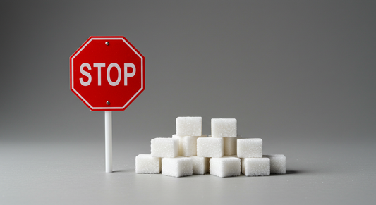 A Red "STOP" sign next to a pile of sugar cubes.