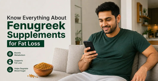 Man reading about fenugreek supplements on phone beside wooden bowl of fenugreek seeds for fat loss metabolism and blood sugar