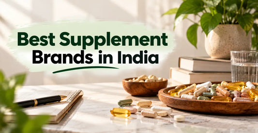 Alt text: Assorted supplement capsules and softgels displayed on table with books beside the headline Best Supplement Brands in India.