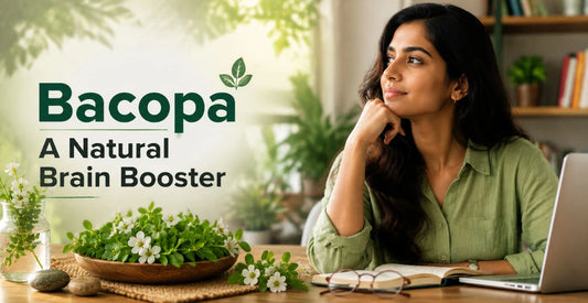 Woman thinking at a desk with fresh Bacopa monnieri plant nearby — Bacopa, a natural brain booster for memory and focus.