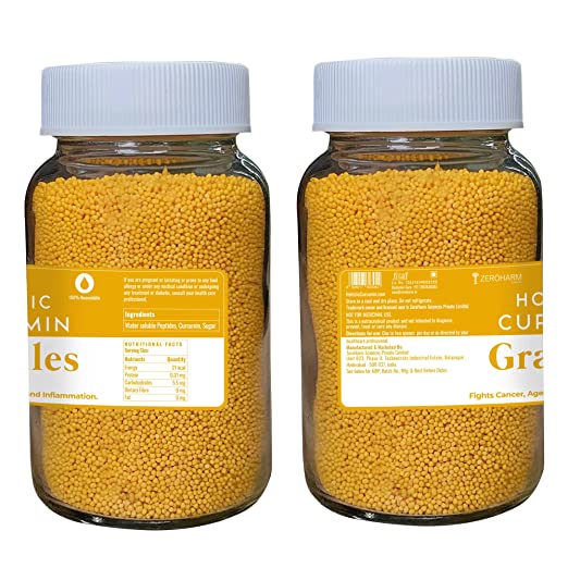 turmeric granules with two glass bottles